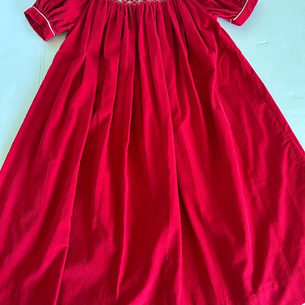 Red Smocked Babydoll Dress with Puff Sleeves 6X
By Royal Child